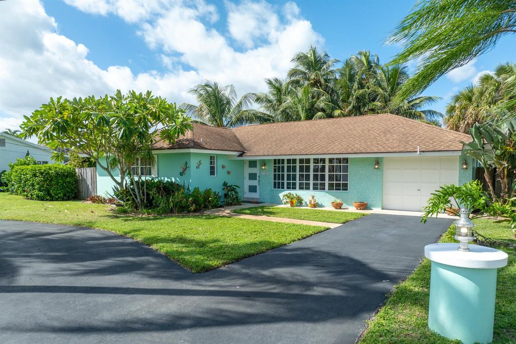 Photo of 7731 Edgewater Drive, Lake Clarke Shores, FL 33406 (MLS # R11133524)