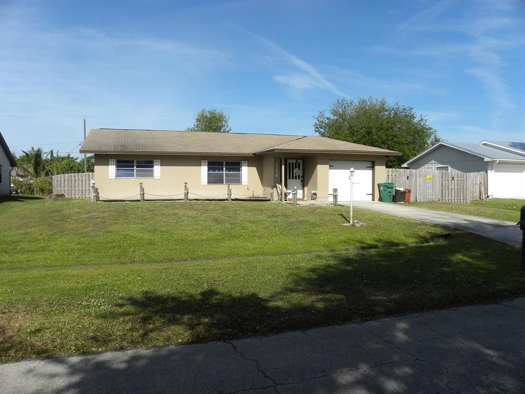 Photo of 1334 SE Concha Street, Port Saint Lucie, FL 34983 (MLS # R10704771)