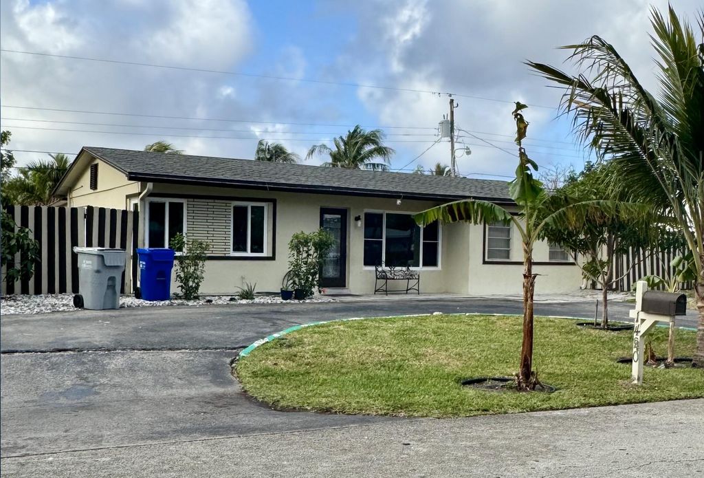 Photo of 1420 NE 32nd Street, Pompano Beach, FL 33064 (MLS # B26026342)