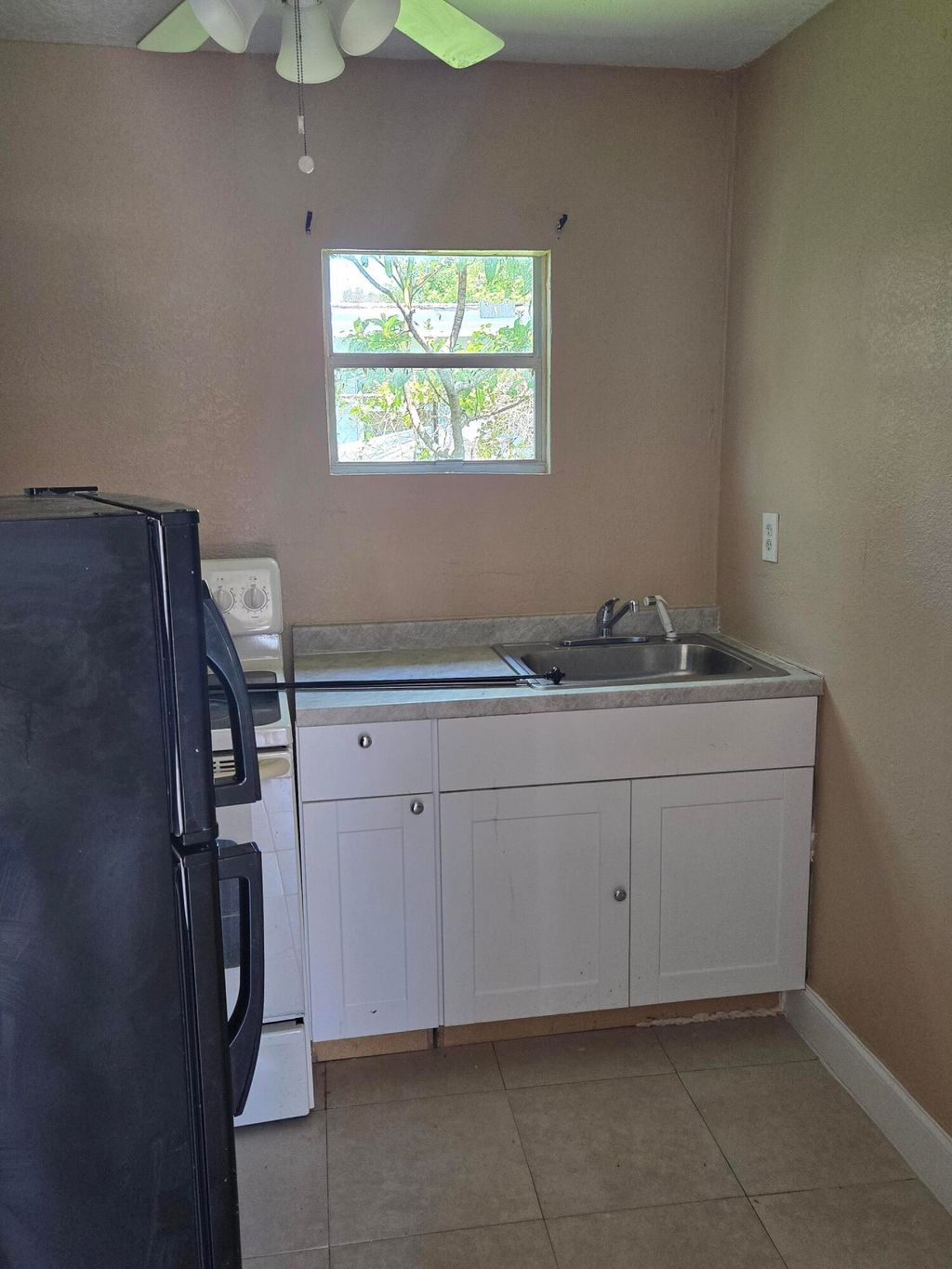 Photo of 815 Silver Beach Road #B, Lake Park, FL 33403 (MLS # B26044597)