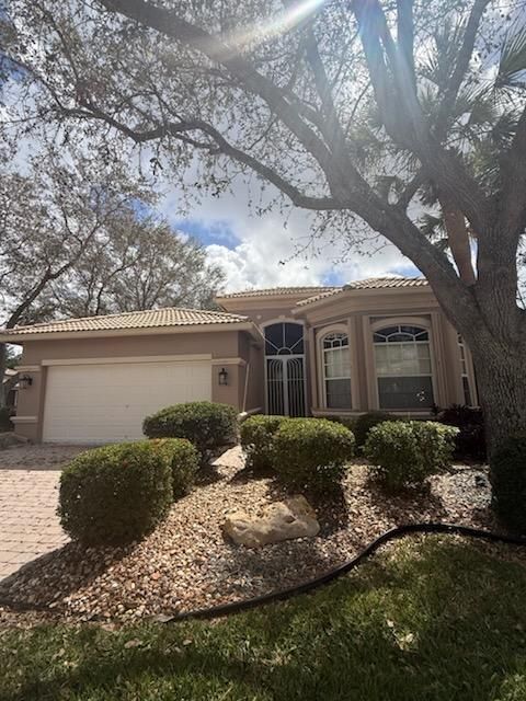 Photo of 9740 Donato Way, Lake Worth, FL 33467 (MLS # B26008787)