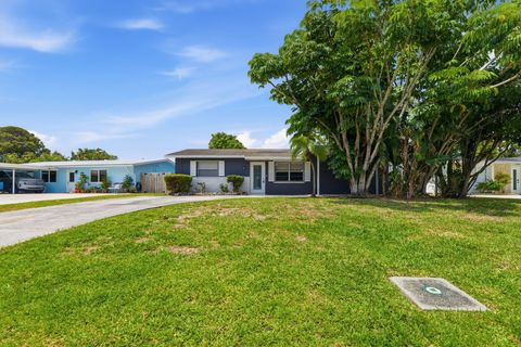 Photo of 625 Riverside Drive, Palm Beach Gardens, FL 33410 (MLS # B26018527)
