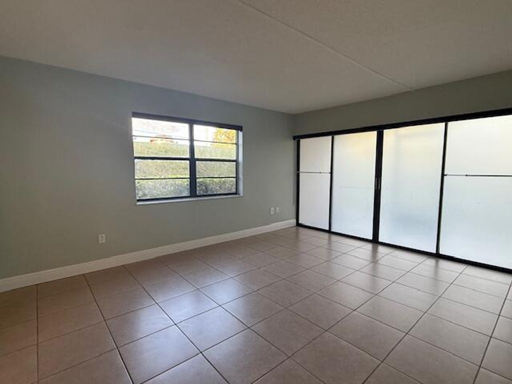 Photo of 2050 Oleander Boulevard #7-106, Fort Pierce, FL 34950 (MLS # R11143799)