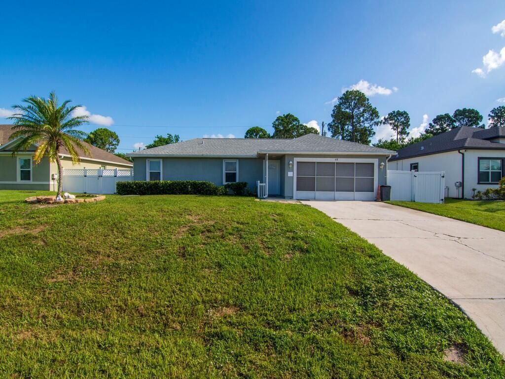 Photo of 618 SW Bradshaw Circle Cir, Port Saint Lucie, FL 34953 (MLS # R10819317)