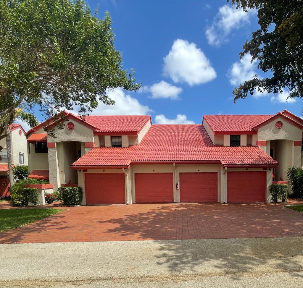 Photo of 7884 Lexington Club Boulevard #B, Delray Beach, FL 33446 (MLS # R11169649)