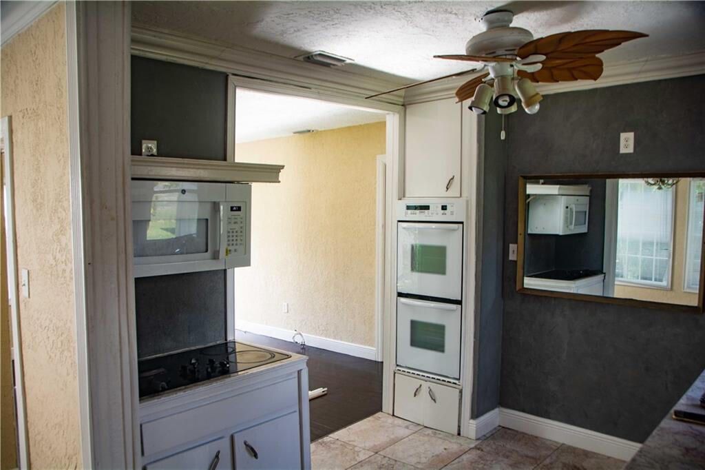 Photo of 36991 3rd Street, Canal Point, FL 33438 (MLS # R10940174)