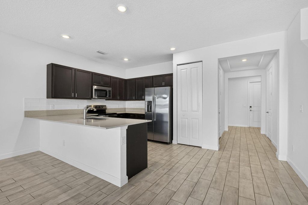 Photo of 4408 Hemlock Drive, Riviera Beach, FL 33410 (MLS # R11167317)