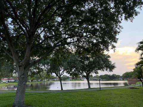Photo of 542 Franconia Circle, Lake Worth, FL 33467 (MLS # B26046667)