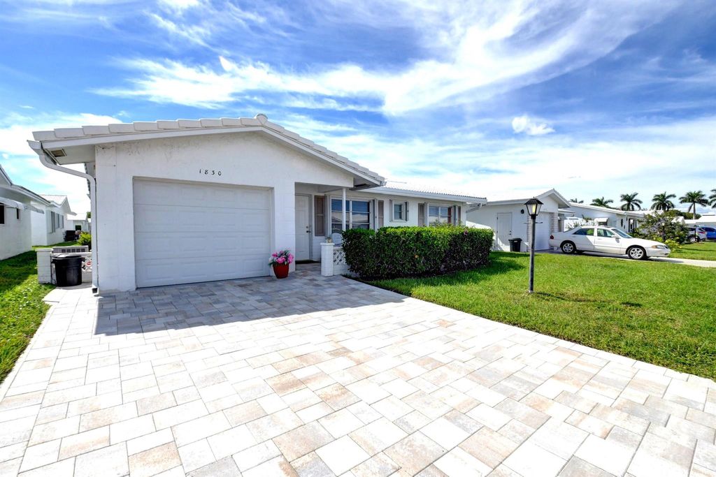 Photo of 1830 SW 17th Street, Boynton Beach, FL 33426 (MLS # R10928311)