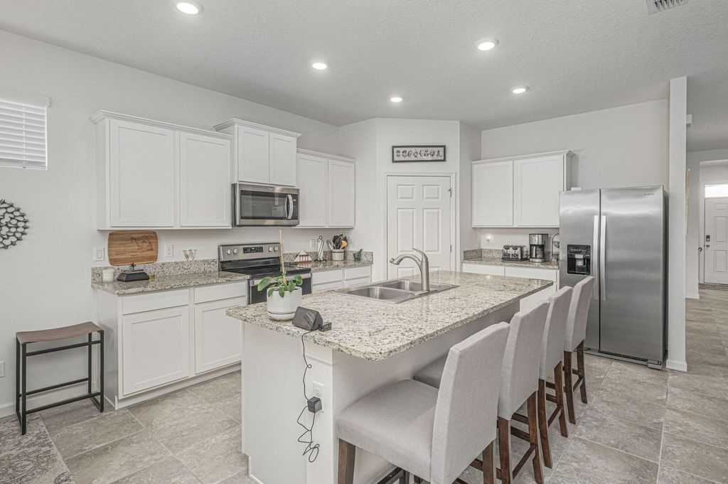 Photo of 10553 SW Toren Way, Port Saint Lucie, FL 34987 (MLS # R10935639)