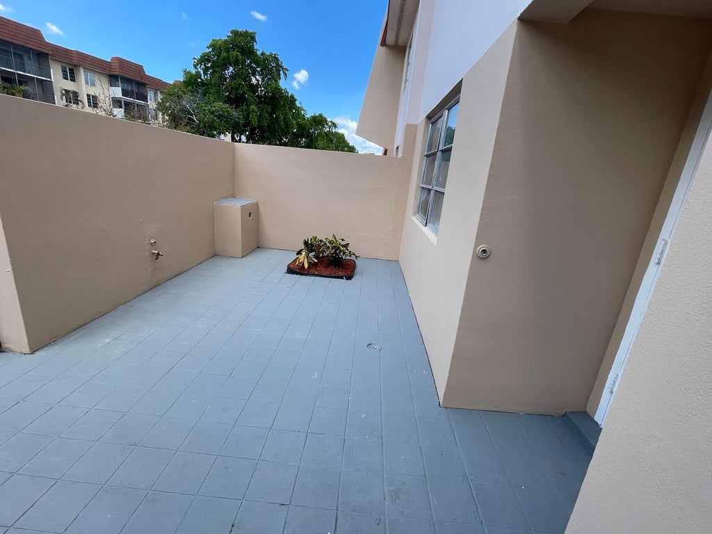 Photo of 4140 Inverrary Drive #15e, Lauderhill, FL 33319 (MLS # B26047205)