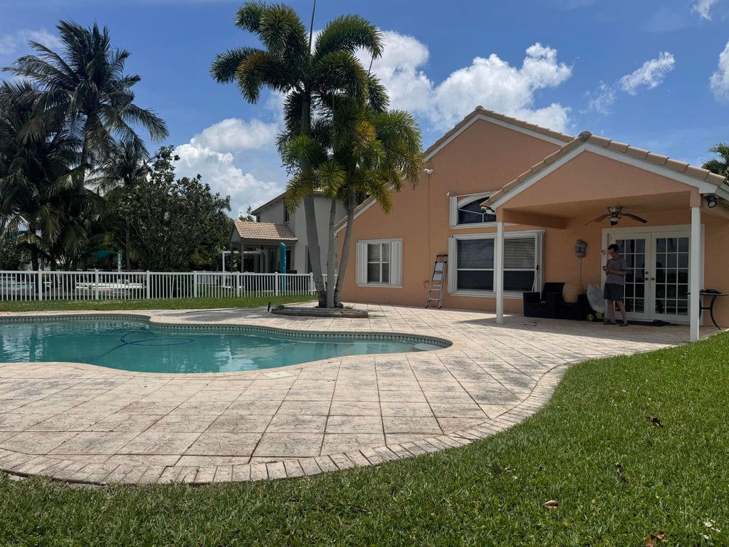 Photo of 1490 NW 144th Avenue, Pembroke Pines, FL 33028 (MLS # B26025080)