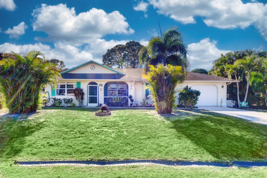 Beautifully Appointed Home, Furniture Included at No Extra Cost. This Charmer would be great for Seasonal Visitors or Full Time Residents. Present owner only uses home a few months out of the year. Great Neighborhood just North of Crosstown near Shopping, Restaurants, and Entertainment. Minutes from Park with Boat Ramp into St. Lucie River and Ocean Access. Property is Pleasantly Landscaped and contains a Brand New Wood Fence and  a 50-foot City drainage area adding a buffer from rear neighbors. This Well-Maintained Home Features: Cathedral Ceiling, Walk-in Closet, Skylight in Master Bath, Eat-in Kitchen, Pantry, Enjoyable Large Screened Back Porch, Screened Front Porch, Deep Garage, Inside Paint in 2016, A/C Air Handler and Plenum in 2020, ADT Home Security. Measurements are appoximate.