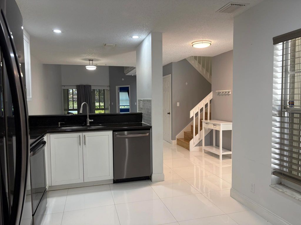 Photo of 1704 Maplewood Drive, Greenacres, FL 33415 (MLS # R11104510)