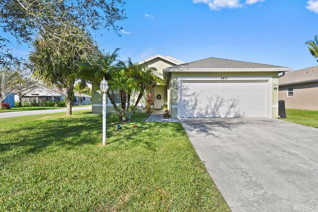 Photo of 2471 SW Impala Way, Stuart, FL 34997 (MLS # R10766533)