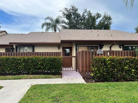 Photo of 1027 Green Pine Blvd #C, West Palm Beach, FL 33409 (MLS # F10532354)