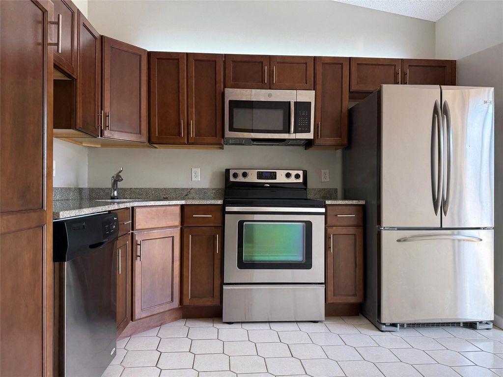 Photo of 1027 Green Pine Blvd #C, West Palm Beach, FL 33409 (MLS # F10532354)