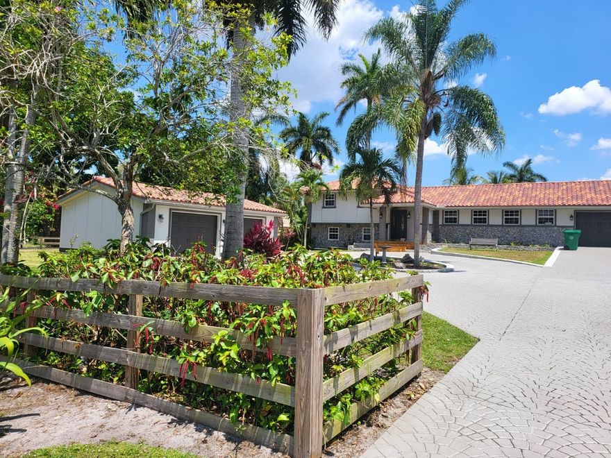 Nestled in the prestigious Davie Area, this exquisite 4-bedroom, 5-bathroom estate  Fully remodeled in 2002 & meticulously maintained, this **3,923 sq ft. Step inside to an open-concept layout flooded with natural light, featuring gleaming tile flooring throughout, fireplace in the family room, .The **gourmet kitchen** , stainless steel appliances, granite countertops,  ample cabinetry ideal for entertaining or casual family meals. The **primary suite** is a true retreat, complete with a spa-like en-suite bathroom, a soaking tub, and direct access to the balcony overlooking the lake. Upstairs, 3 comfortable bed 2 full baths  Maids room perfect for live-in help spacious playroom or private office with a separate entrance endless potential for a home business, gym or studio