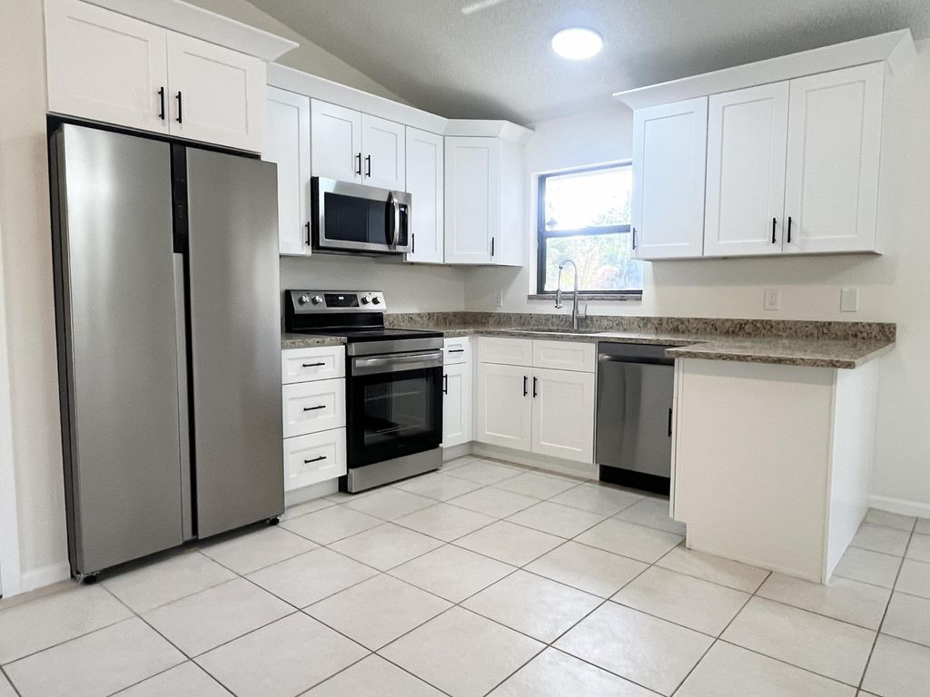 Photo of 15734 89th Place N, Loxahatchee, FL 33470 (MLS # R11163584)