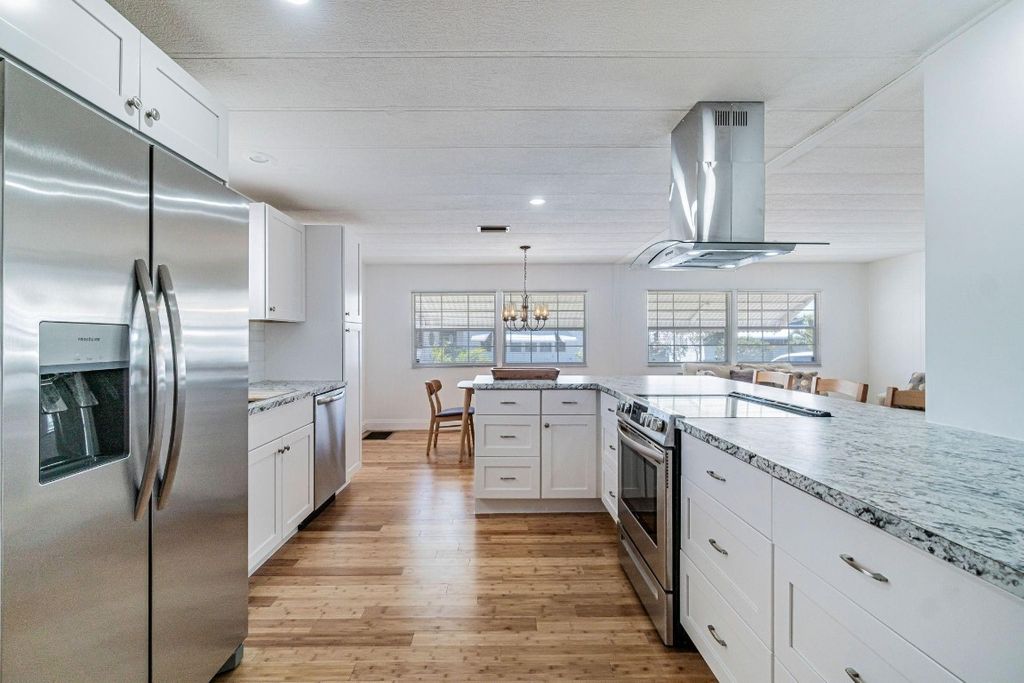 Photo of 113 NW 52nd Court, Deerfield Beach, FL 33064 (MLS # F10505916)