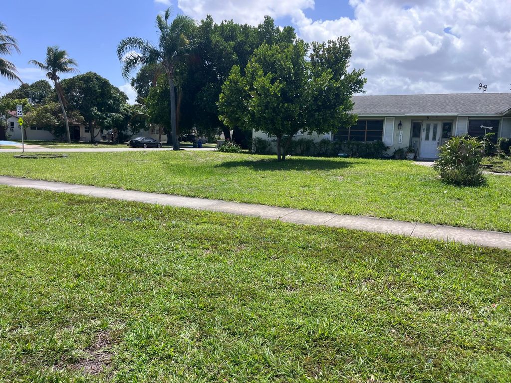 Photo of 1400 Flagler Boulevard, Lake Park, FL 33403 (MLS # B26017818)