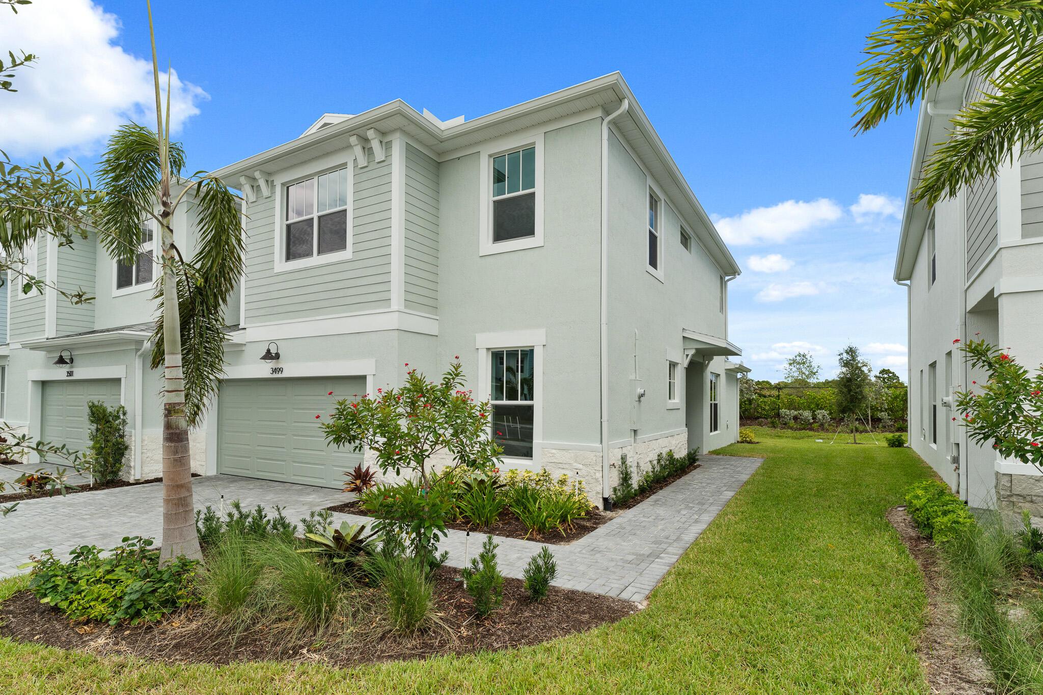 DESIGNER FURNITURE PACKAGE INCLUDED!This 2,014 sq. ft. floorplan has a spacious great room and dining room with a large kitchen in the rear of the home. Plenty of windows lends for an abundance of natural light to enter. Off of the great room, you will find a patio door leading out to a generously sized covered lanai perfect for sitting outside by the lake. Up the stairs of this two story plan you will find a large owner's suite with a bath to match. Double vanities, a walk-in shower and walk-in closets make this the suite of your dreams. Across the hall, you will notice a good separation of the upstairs with the additional bedrooms and bath in the front of the home. Additionally in this plan you will have a conveniently sized laundry room upstairs.
