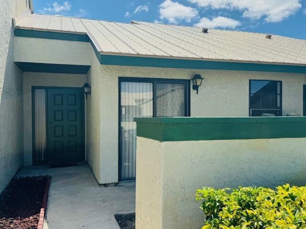 Photo of 605 SW Jeanne Street, Port Saint Lucie, FL 34953 (MLS # R10980173)