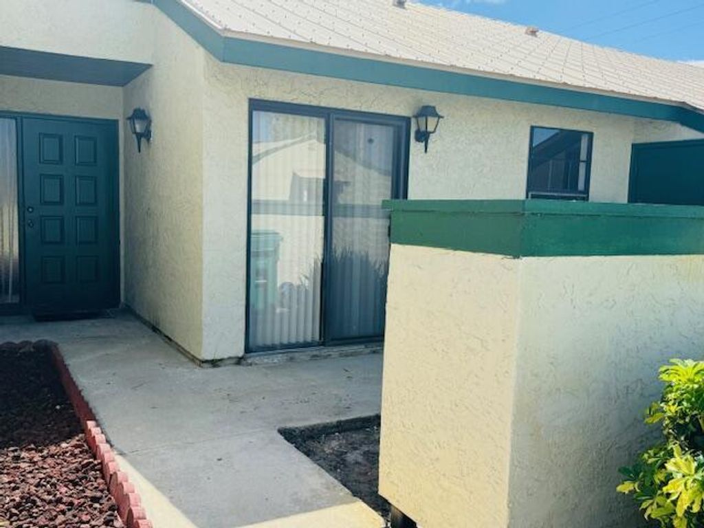 Photo of 605 SW Jeanne Street, Port Saint Lucie, FL 34953 (MLS # R10980173)