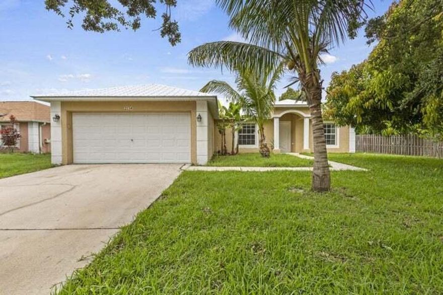 Spacious 4-Bedroom Home for Rent in Port Saint Lucie!Discover comfort and convenience in this beautifully updated 4-bedroom, 2-bath home with a 2-car garage. This property is move-in ready and designed for easy living.Located just minutes from Tradition, I-95, Walmart, Sam's Club, and plenty of new shops and restaurants, you'll have everything you need right at your fingertips. Enjoy a peaceful setting in a well-established neighborhood with no HOA.