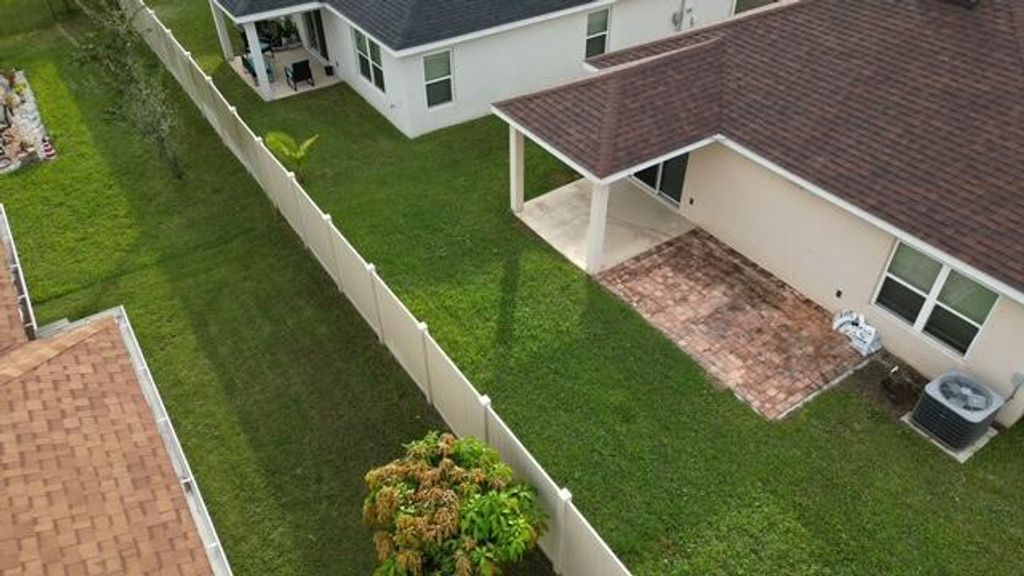 Photo of 5870 NW Pine Trail Circle, Port Saint Lucie, FL 34983 (MLS # R11038777)