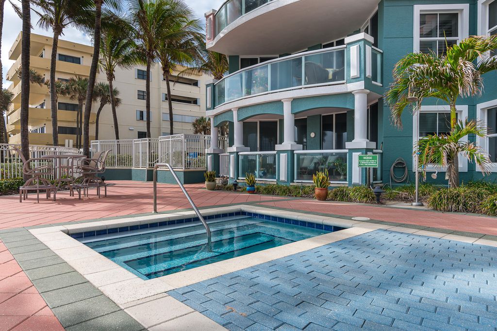 Photo of 2051 SE 3rd Street #101, Deerfield Beach, FL 33441 (MLS # B26012407)