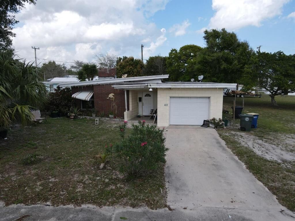 Photo of 422 Pinewood Drive, Fort Pierce, FL 34950 (MLS # R10692828)