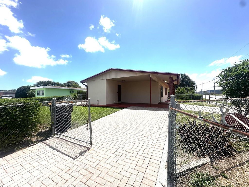 Photo of 3500 Lake Avenue, West Palm Beach, FL 33405 (MLS # B26016147)