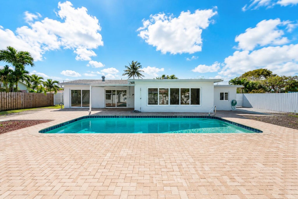 Photo of 461 NE 44TH Street, Boca Raton, FL 33431 (MLS # B26063009)