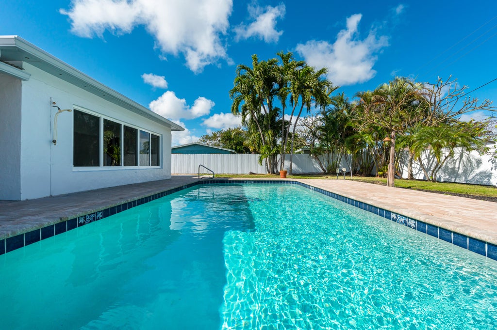 Photo of 461 NE 44TH Street, Boca Raton, FL 33431 (MLS # B26063009)