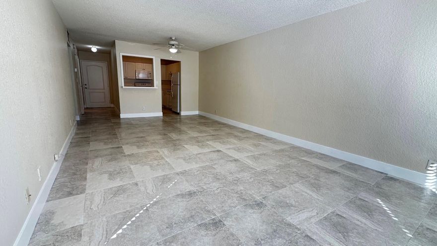 Large 1 bedroom /1 1/2 bath on 1st floor. Centrally located in Deerfield Beach. The property has a combination washer-dryer inside the condo. Impact windows, freshly painted and new tile floors throughout. Secured Building access. Rent includes water/sewer and trash. The community has two pools, a gym, and a common laundry room. NO PETS allowed as per the owner.  Association approval required. All ages community, close to the beach, highways, shopping, and dining. Easy to show.