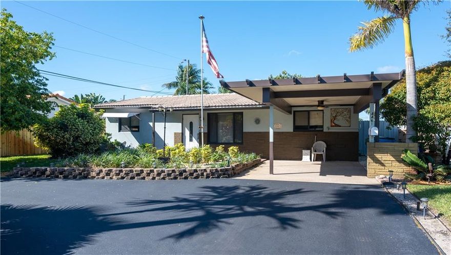 Beautiful Pool home in Coral Heights, one of the most desirable neighborhoods in Broward. This is a MUST SEE & is MOVE IN READY. Lots of upgrades. Remodeled kitchen with granite countertop & all stainless steel appliances included, inside laundry room with washer & dryer. Remodeled both bathrooms (new tile, fixtures, vanities & toilets). The home has hurricane impact windows & sliding door, new gutters & PVC fascia board, new asphalt driveway (just recoated). New maintenance free carport & outdoor fan, new maintenance free backyard patio awning & outdoor fan. Pool was just remodeled with diamond bright, a new skimmer, surround tiles & pool pump. New solid wood interior doors, freshly painted interior & a beautifully landscaped yard, large PVC storage shed with lawn equipment included.
