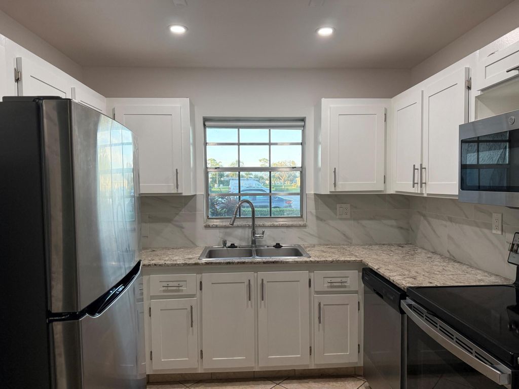 Photo of 14676 Canalview Drive #A, Delray Beach, FL 33484 (MLS # R11149657)