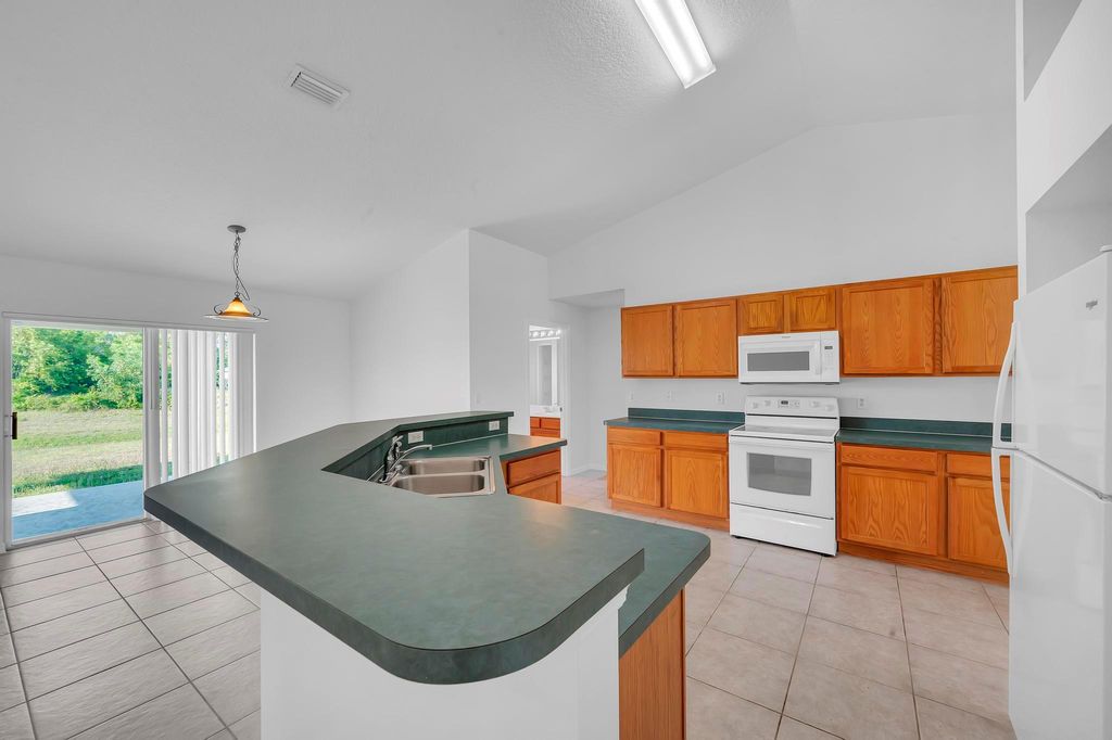 Photo of 446 SW South Quick Circle, Port Saint Lucie, FL 34953 (MLS # R11123543)