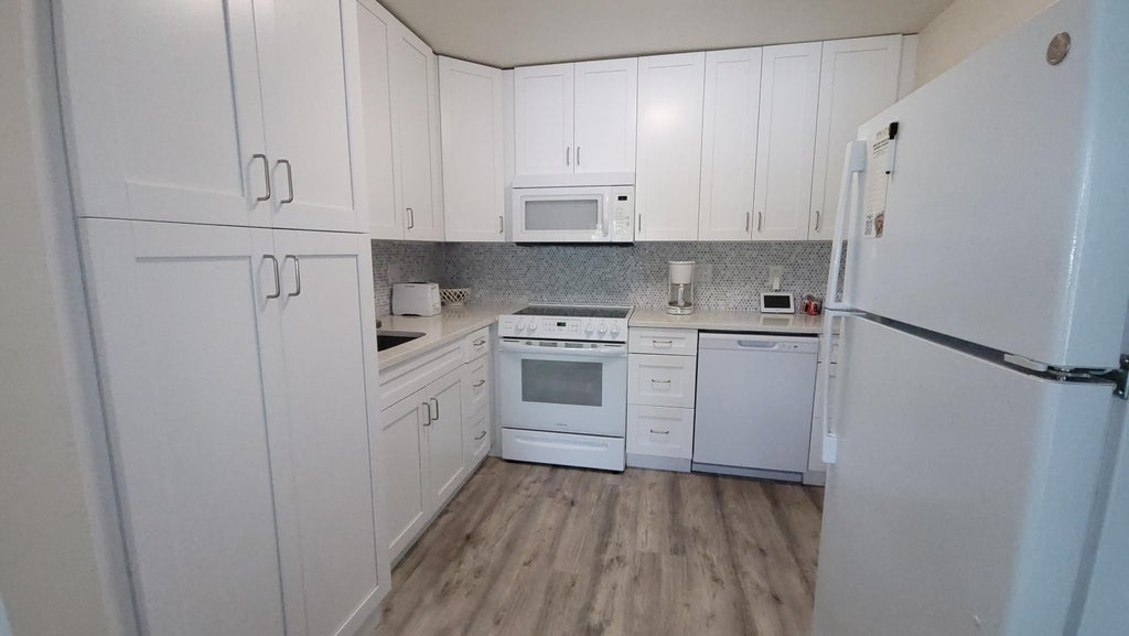 Photo of 50 Plymouth, West Palm Beach, FL 33417 (MLS # B26043440)