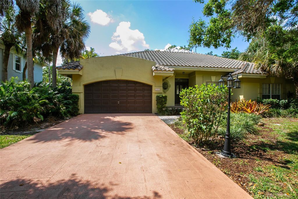 Photo of 6050 NW 68th Manor, Parkland, FL 33067 (MLS # F10498800)
