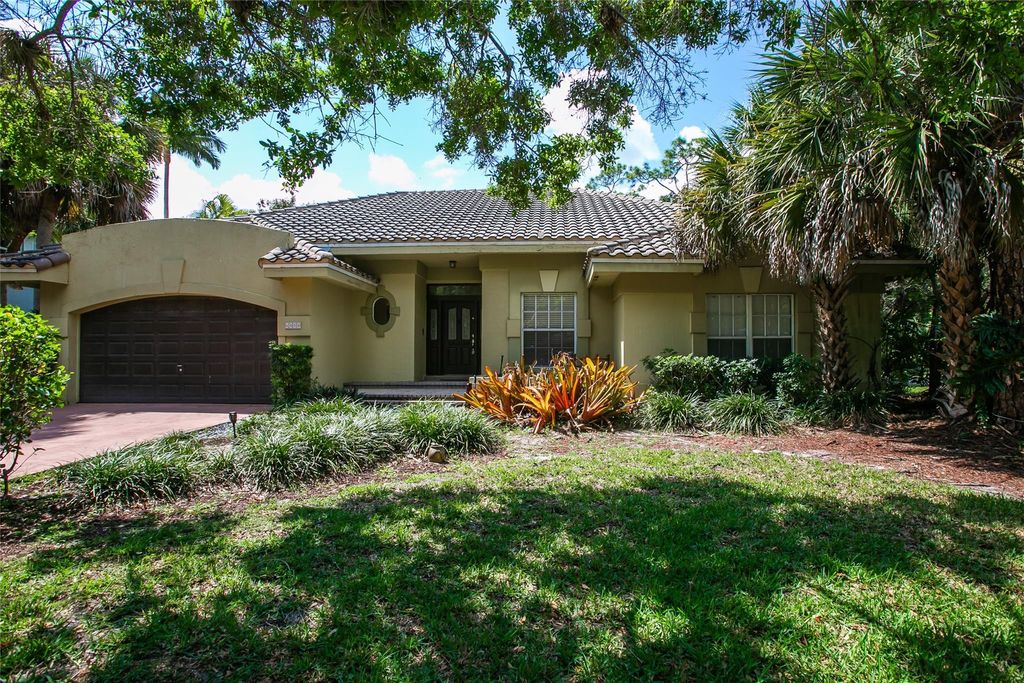 Photo of 6050 NW 68th Manor, Parkland, FL 33067 (MLS # F10498800)