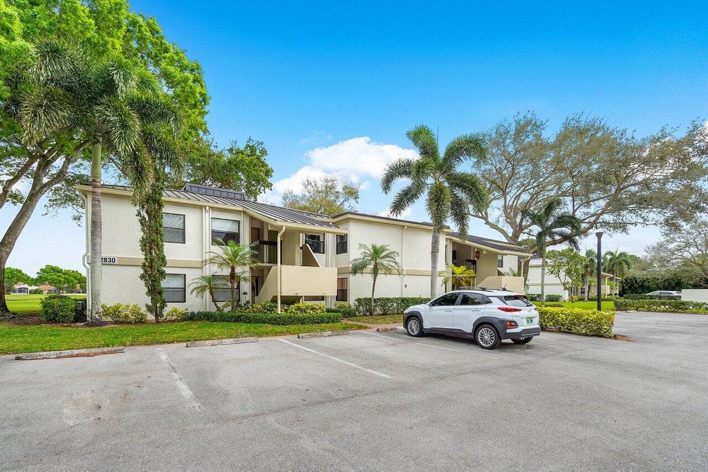 Photo of 12830 Briarlake Drive #202, Palm Beach Gardens, FL 33418 (MLS # R10958728)