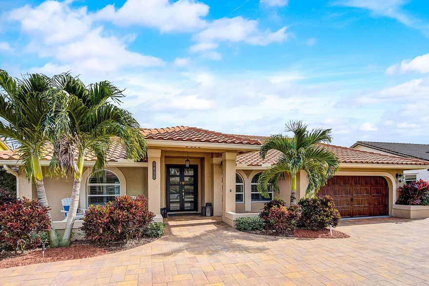 ABSOLUTELY STUNNING!! HANDS DOWN the NICEST home in ALL OF CORAL SPRINGS for the price! COMPLETELY remodeled from floor to ceiling. Owners went way over the top on this one :) Open floorplan with a remarkable kitchen featuring 42" two toned cabinetry, quartz countertops with a waterfall edge, Kitchen Aid appliances, and a MASSIVE sink. Oversized master suite fit for a King with a GIANT California closet that is as big as a bedroom. Huge en-suite bathroom boasting dual vanities, a frameless glass waterfall shower, and a roman tub. ALL IMPACT WINDOWS AND DOORS. Private, fully turfed backyard oasis offers a stunning pool with a sun-shelf, a pergola, and pavers. Zoned for great schools. Close to shopping, dining, and entertaining needs. You better make an offer before... BOOM......She gone!