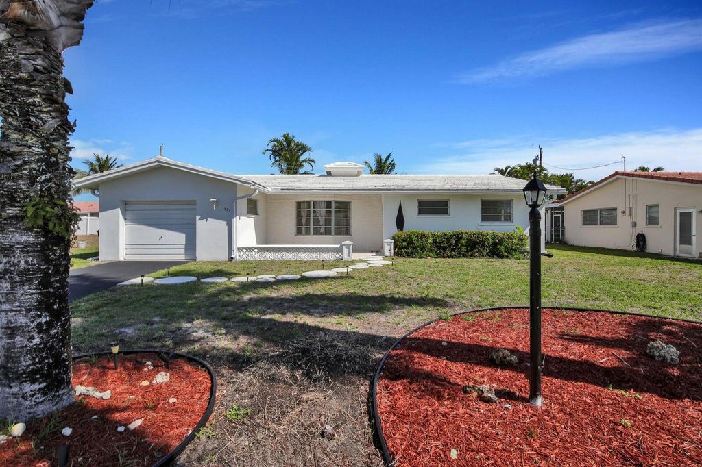 Photo of 301 NE 24th Street, Boca Raton, FL 33431 (MLS # R11121605)