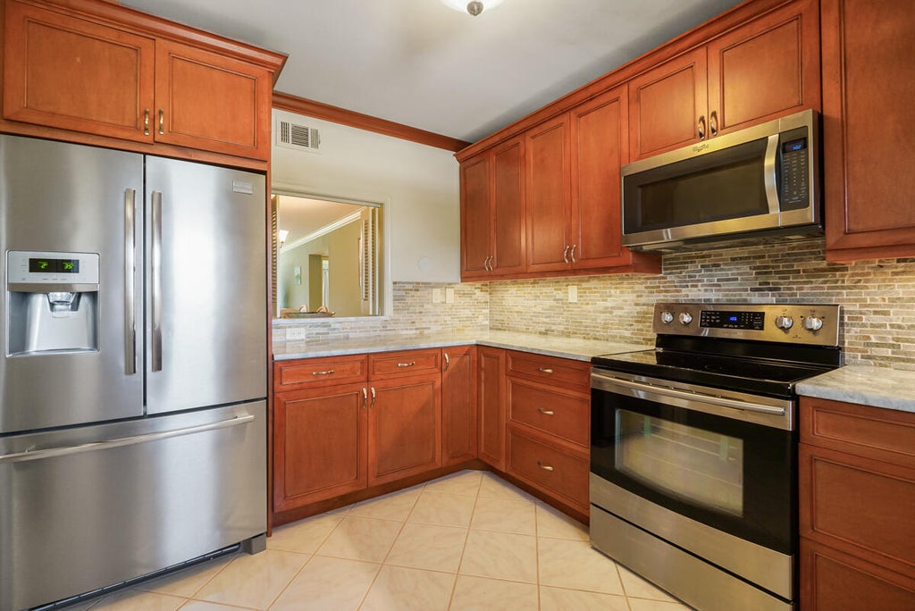 Photo of 300 N Hwy A1A #F-306, Jupiter, FL 33477 (MLS # B26053888)