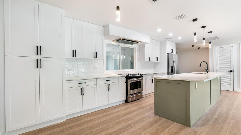 Photo of 4397 Avocado Boulevard, West Palm Beach, FL 33411 (MLS # R11015095)