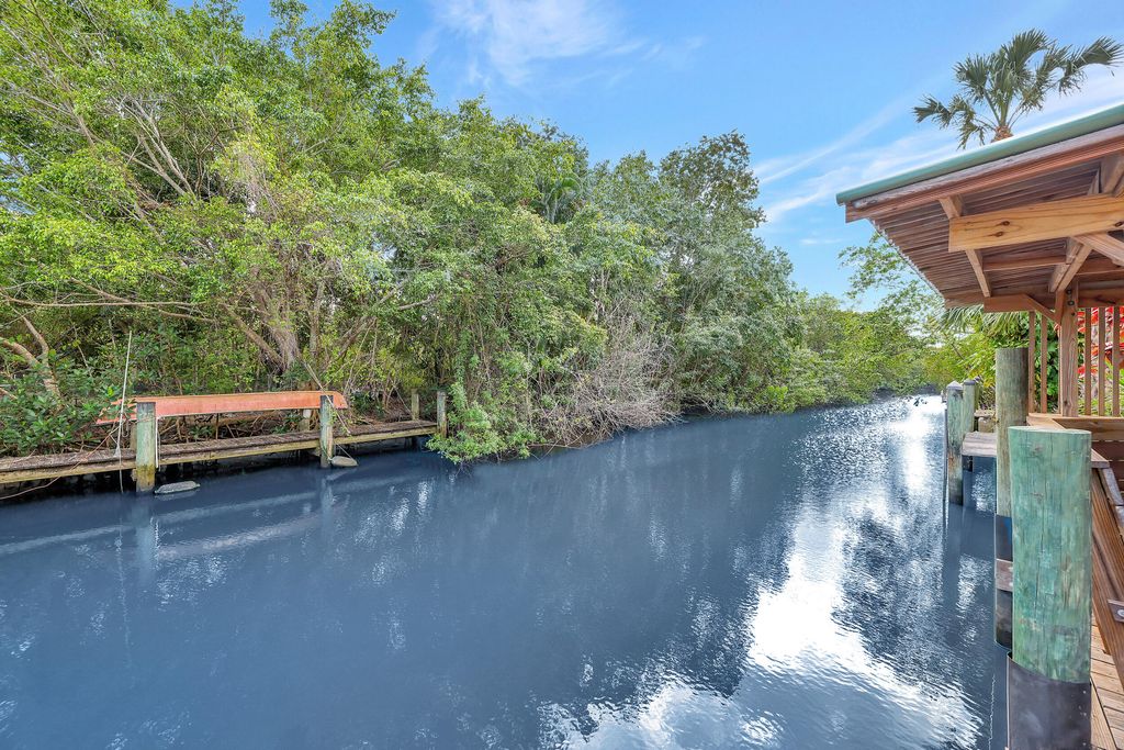 Photo of 20 SW Hideaway Place, Stuart, FL 34994 (MLS # R10966881)