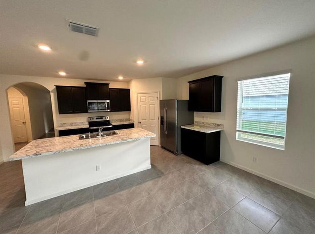 Photo of 311 SW Aero Circle, Port Saint Lucie, FL 34953 (MLS # R11165584)