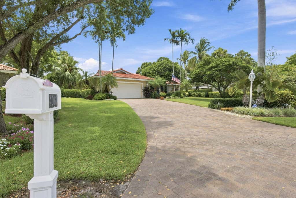 Photo of 4060 Cypress Hammock Lane, Pompano Beach, FL 33069 (MLS # B26051894)